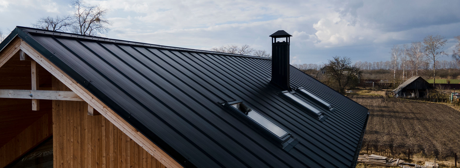 High-angle view of a metal roof on a wooden house